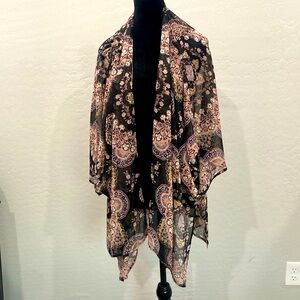 Stunning shawl with sleeves